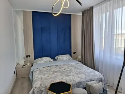 dormitor cu pat si ventilator apartament inchiriere Sector 1, București